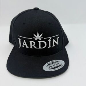 The Classic Black 'JARDÍN' Snapback Hat with White Embroidery